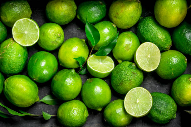 istock Fresh juicy lime with leaves. 1141513352
