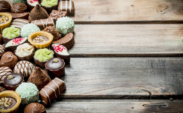 istock Chocolate sweets with nuts and various fillings. 1141513860