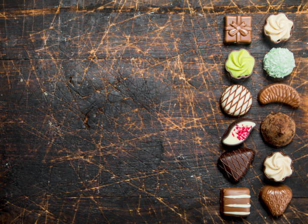 istock Chocolate sweets with nuts and various fillings. 1141514726