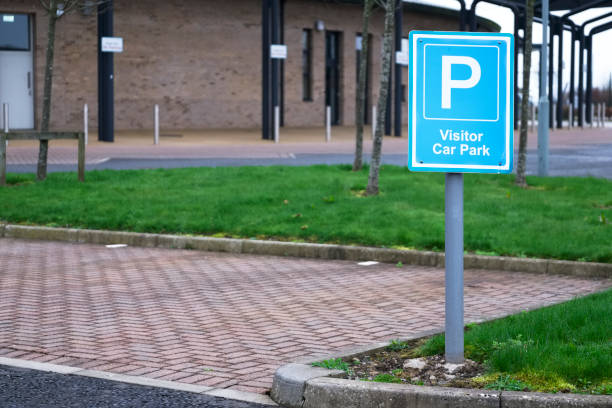 istock Visitor car park space at school grounds sign 1141516305