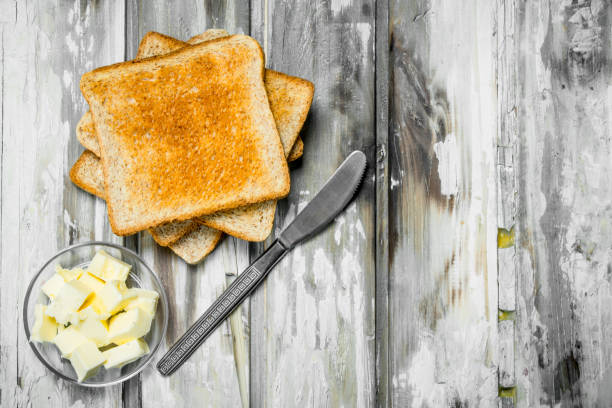 istock Breakfast. Toasted bread and butter . 1141516572