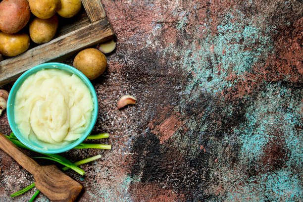 istock Mashed potatoes in a bowl with green onions . 1141516620