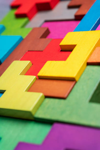 Geometric shapes on a wooden background.