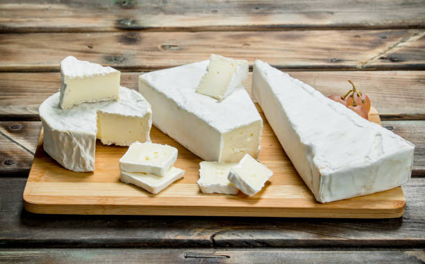istock Brie cheese on the chopping Board. 1141517384