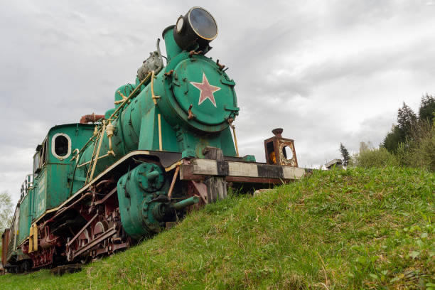 Kolochava, Ukraine - April 18, 2016: Old Soviet locomotive stands on a dead-end path