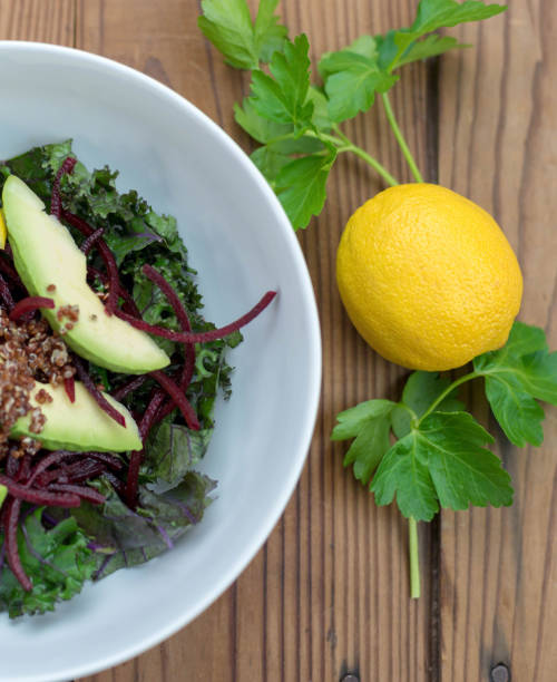 istock Kale salad with quinoa and avocado 1141519016