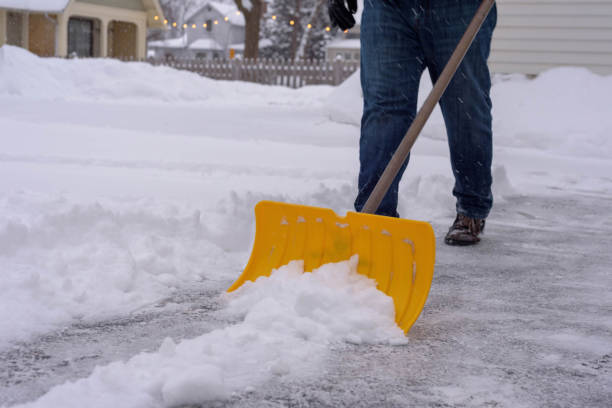 istock Man shoveling snow in winter 1141520796