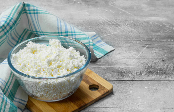 istock Cottage cheese in bowl on napkin. 1141521554