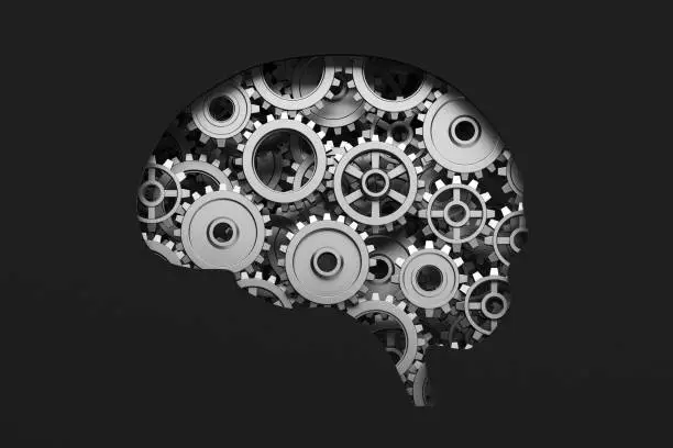 Photo of Brain with gears on black