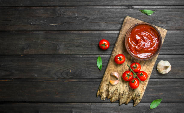 istock Tomato sauce in bowl on cutting Board. 1141522400