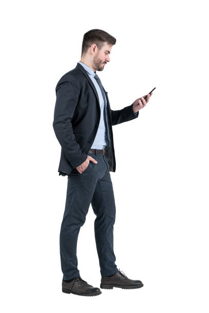 istock Businessman looking at smartphone, full 1141522683