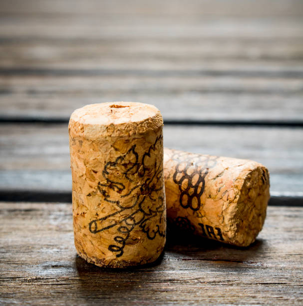 istock Wine corks on wooden background. 1141524416