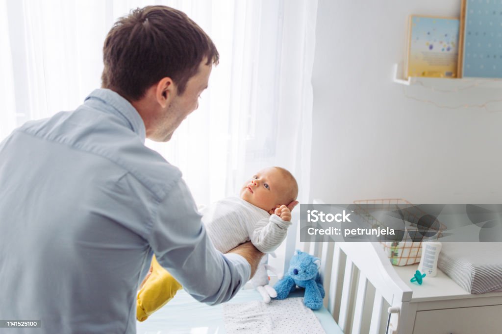 Time for them Father carrying baby son, baby like it 2-5 Months Stock Photo