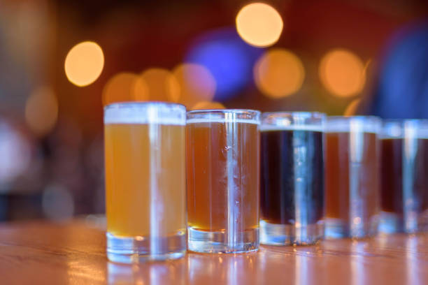 istock Glasses of beer lined up on restaurant table for tasting 1141526336