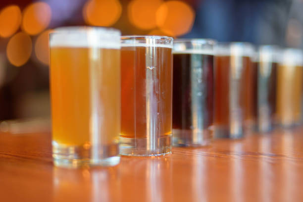istock Low angle view of beer glasses lined up for a tasting 1141526354