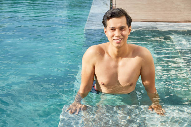 istock Young man in the water 1141526705