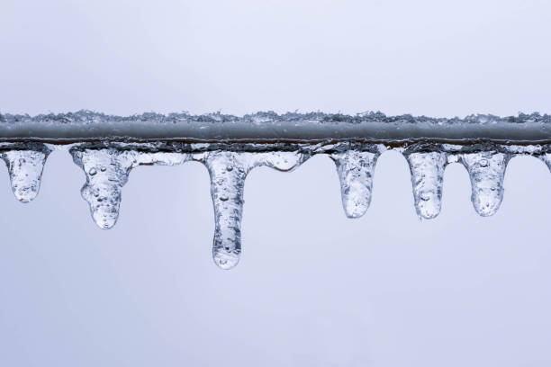 istock Closeup of icicles on a clothesline 1141527793