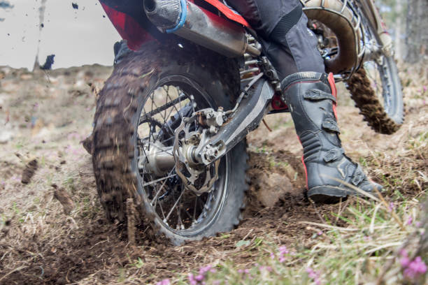 istock motorcycle, throwing the country back wheel 1141528602