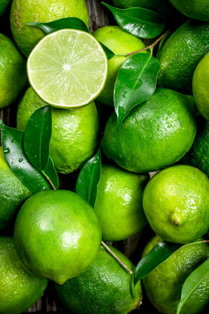 istock Fresh juicy lime with leaves. 1141529299