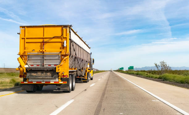 istock Shipping Semi and Trailer on Highway 1141529588
