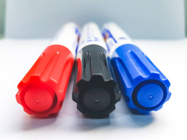 istock Whiteboard marker pens on a white surface. School supplies for writing and teaching. 1141530452