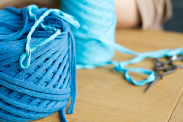 istock Babins with blue and blue yarn for making handmade knitted bags. Selective soft focus. 1141531140