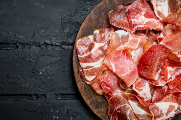 istock Traditional Spanish ham on the Board. 1141531360