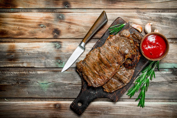 istock Grilled beef steak with sauce. 1141534509