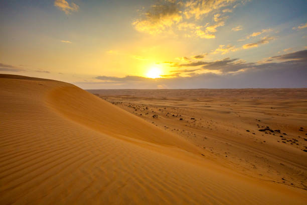 istock View of sunset above desert, Oman 1141536178