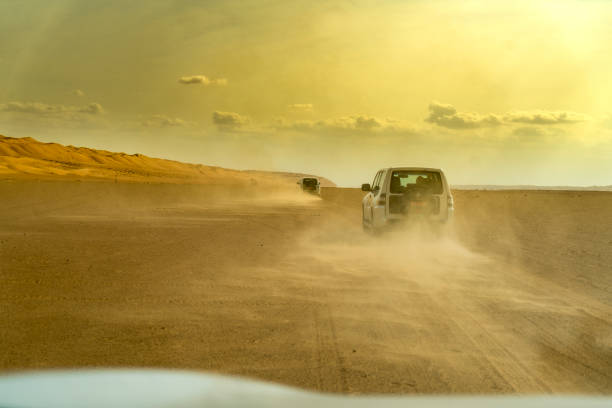 istock View of car on desert, Oman 1141536365