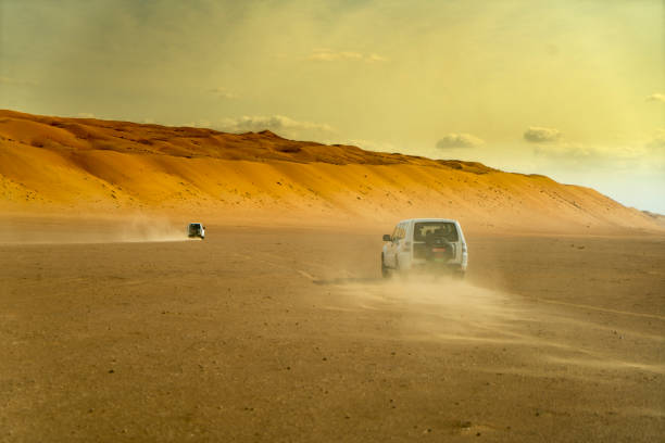 istock View of car on desert, Oman 1141536416