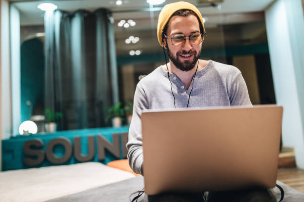 istock Modern hipster influencer working on social media from a cafe 1141539302