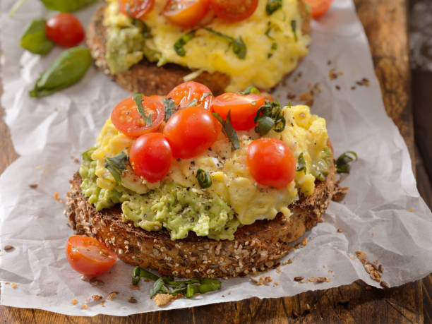 istock Creamy Avocado Sandwich with Scrambled Eggs and Tomatoes 1141541817