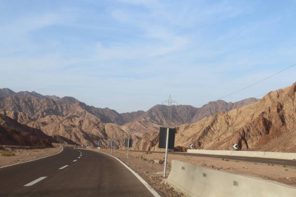 istock Sky and beautiful mountain landscape with road 1141542235