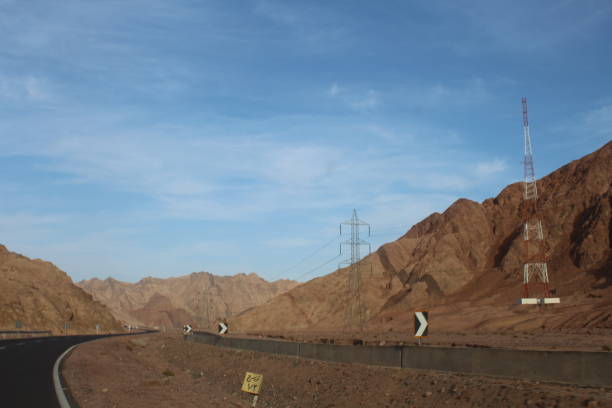 istock Asphalt road in the Egyptian desert. 1141542962