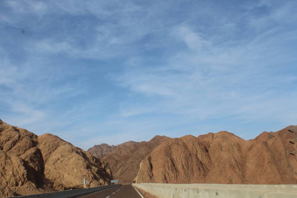 istock Sky and beautiful mountain landscape with road 1141543312