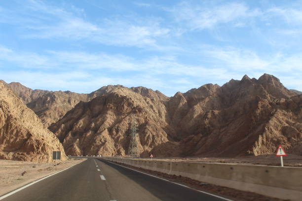 istock Sky and beautiful mountain landscape with road 1141543376