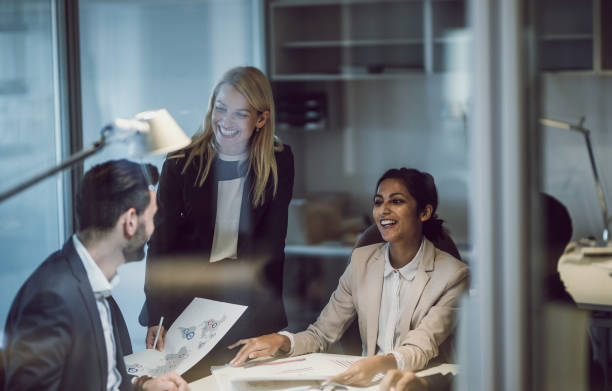 istock Business People Working Late in The Office 1141544566
