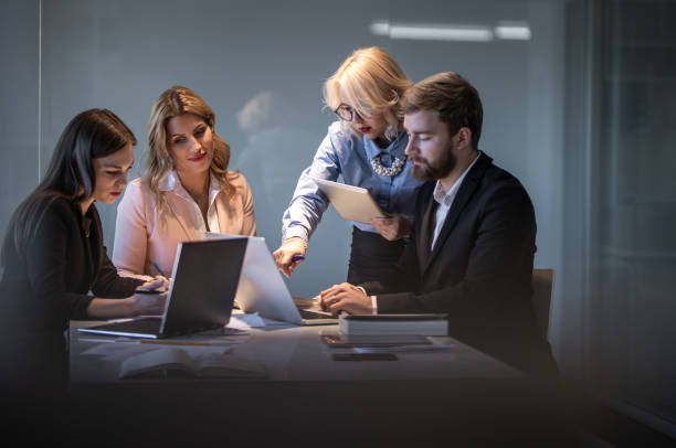 istock Business People Working Late in The Office 1141545125