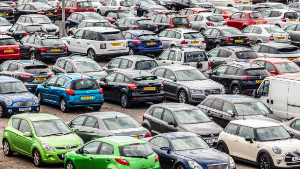 Full carpark at the Ardrossan - Brodick ferry terminal in Ardrossa, North Ayrshire, Scotland. Ardrossan, Scotland, UK - July 14th 2018: Full carpark at the Ardrossan - Brodick ferry terminal in Ardrossan, North Ayrshire, Scotland, UK ardrossan scotland stock pictures, royalty-free photos & images