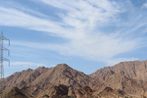 istock Vintage toned scenic desert highway at sunset 1141548120