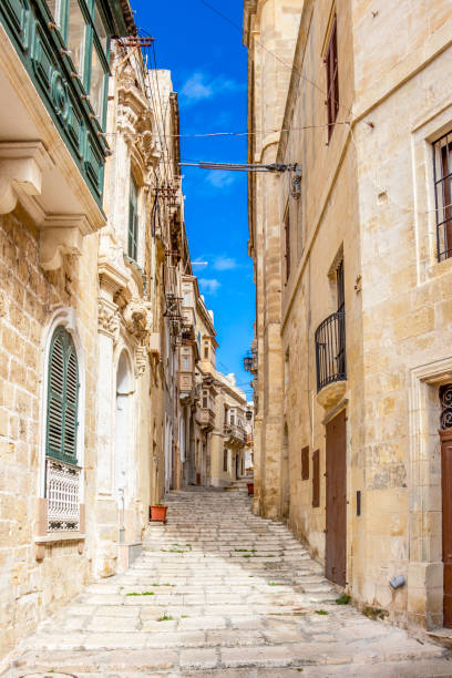 istock Typical beautiful Maltese limestone narrow lane 1141548177