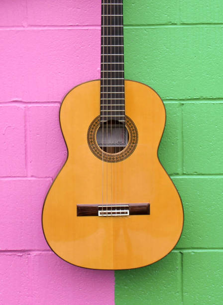istock Guitar signed by Paco de Lucia (pink/green wall) 1141552050