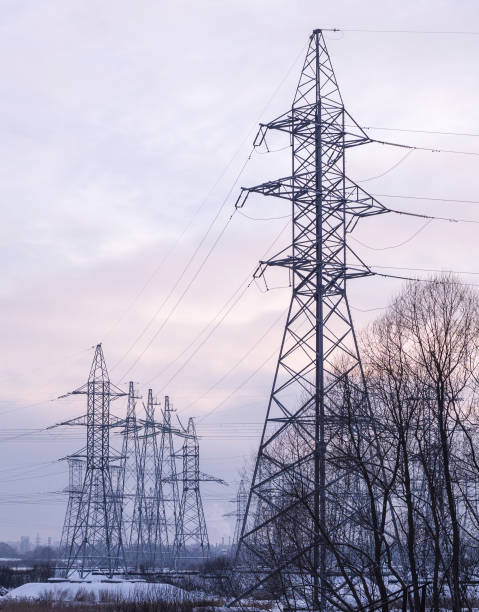 istock power line in winter cloudy evening. industrial, nature. 1141555427