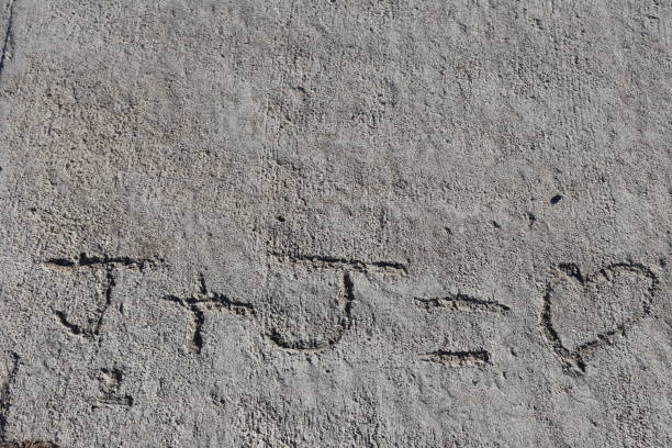 istock Love letter written in cement 1141558813