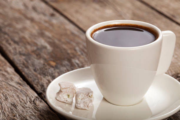 istock coffee  cup over wooden table 1141559572
