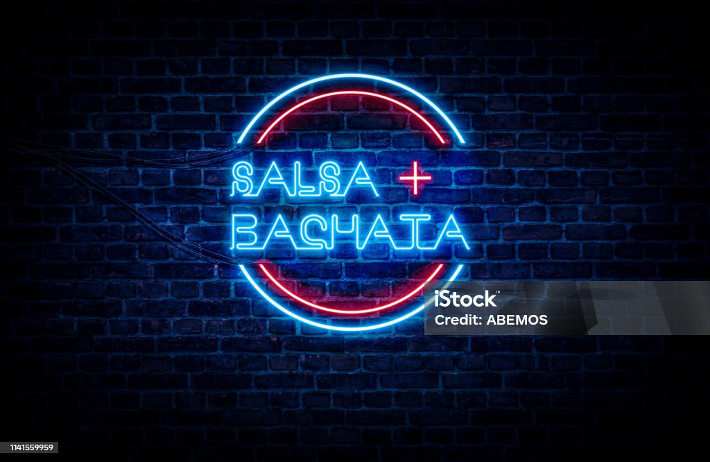 Salsa and Bachata Salsa and Bachata written on a red and blue neon sign, with a brick wall in the background. Salsa Dancing Stock Photo