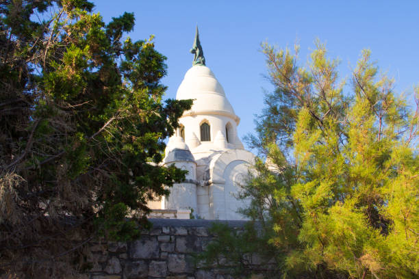 Petrinovic family mausoleum Supetar Supetar, Croatia / August 8th 2017: Petrinovic family mausoleum in Supetar cemetery old town Supetar, Brac Island. Croatia, Europe old catholic church on island brac croatia stock pictures, royalty-free photos & images