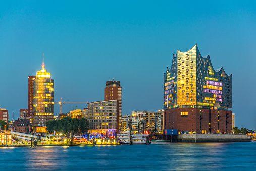 Night view of the port of hamburg with the elbphilharmonie building, Germany.