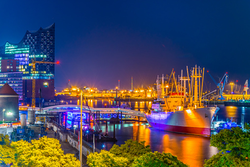 Night view of the port of hamburg with the elbphilharmonie building, Germany.